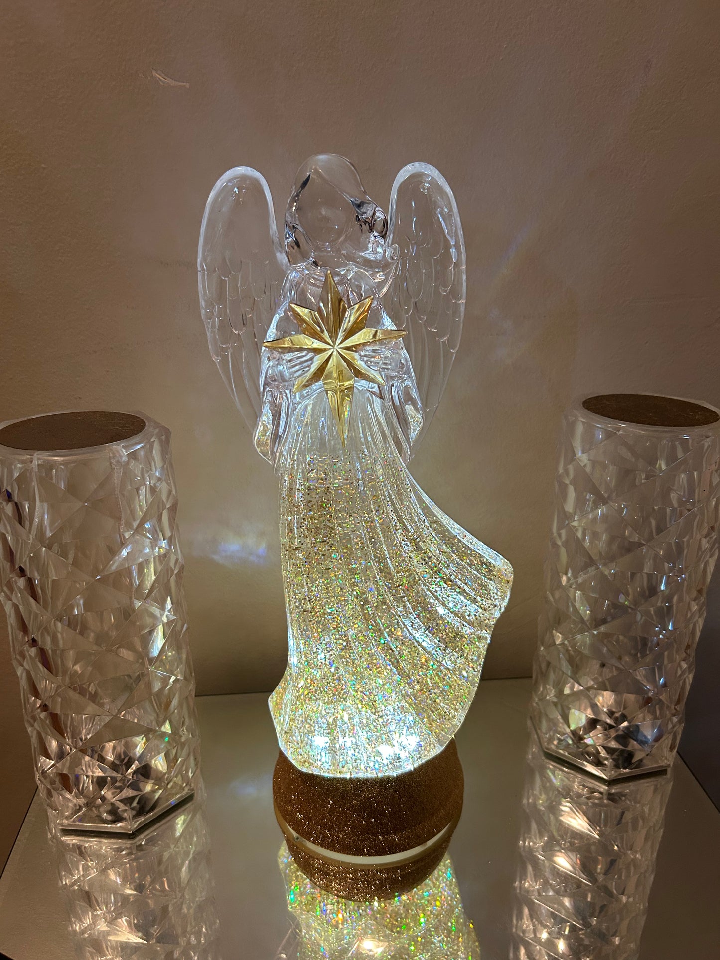 THEY’RE SELLING FAST 🙌🏾(NOT MANY LEFT) SO GET YOU ONE! BUY MY NEW LIMITED EDITION CHRISTMAS ANGEL NOW WHILE SUPPLIES LAST! Illuminate your holiday gatherings with the enchanting charm of St. Nicholas Square. This luminous angel table decor, bathed in s